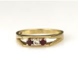 9ct yellow gold diamond and ruby trilogy ring, round brilliant cut diamond approx 0.06ct, one 2.