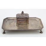 Silver tray with mounted inkwell, raised on four feet, hallmarked 'E&Co., Birmingham 1927', glass