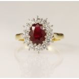 18ct yellow gold ruby and diamond cluster ring, oval mixed cut fine ruby approx 1.75ct, surrounded