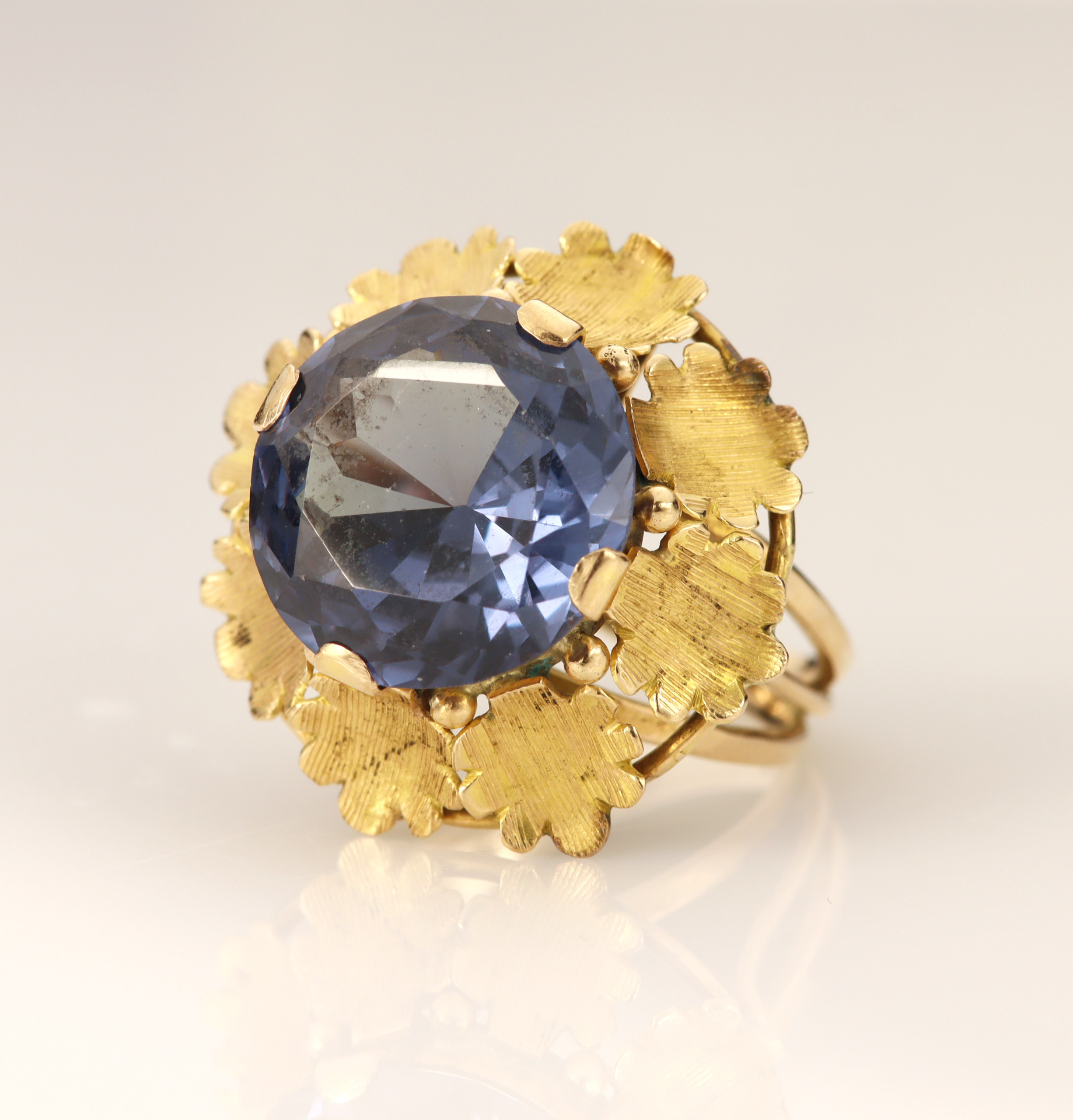 Yellow gold (tests 18ct) cocktail dress ring, set with one round mixed cut synthetic colour change