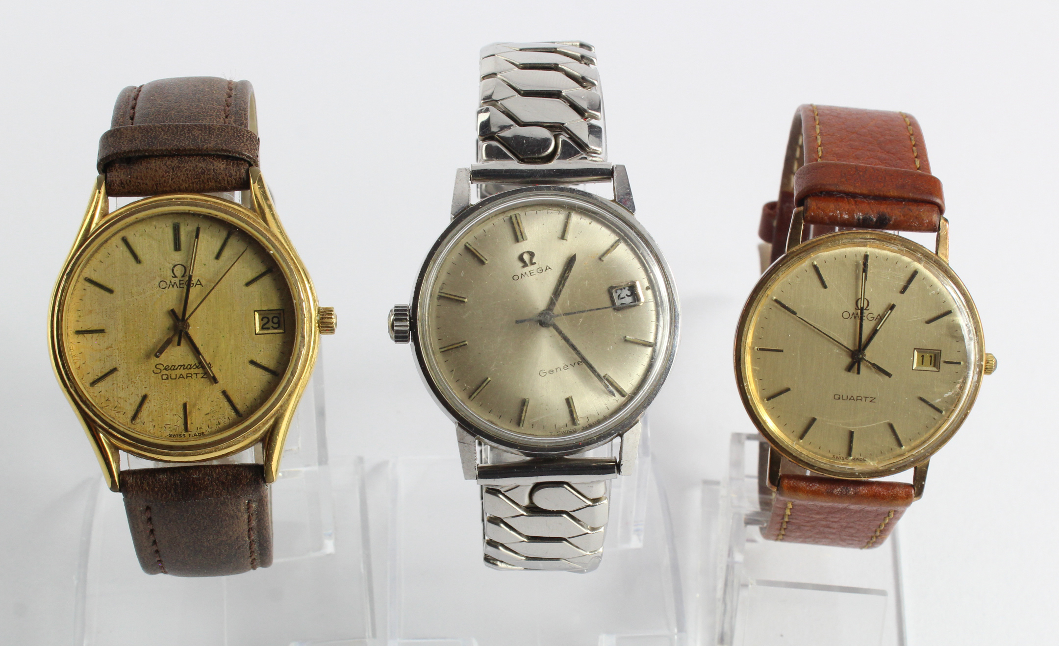 Three gents Omega wristwatches, gold plated Seamaster quartz, 9ct cased quartz & stainless steel