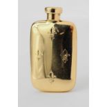Yellow gold (tests 14ct) flask shaped perfume bottle, hand engraved with four fleur-de-lys, screw