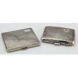 Pair of silver engine-turned cigarette cases , hallmarked Birm. 1938 and 1955. Total weight of