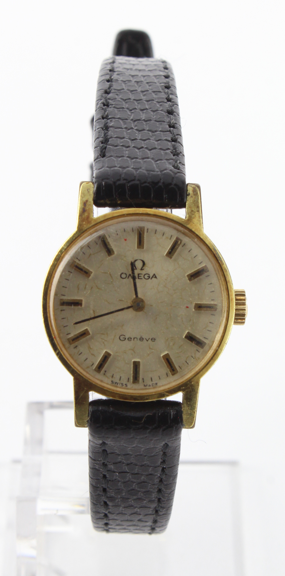 Ladies gold plated manual wind Omega geneve wristwatch. The 20mm dial with gilt baton markers, on