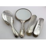 Mixed lot of silver mounted dressing table items comprising hand mirror hair brush & two clothes