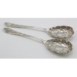 Pair of silver berry type fruit spoons hallmarked. HA Sheffield 1900 & 1901. Weight of both 3.5 oz