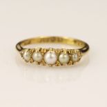 18ct yellow gold Victorian pearl ring, set with five graduating half pearl's principle measures 4mm,