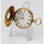 Yellow metal (tests as 18ct) mid-size half hunter pocket watch. Approx 35mm dia, total weight 38.9g.