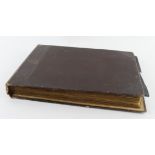 Photograph album. An album containing approximately sixty large black & white photographs, including