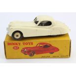 Dinky Toys, no. 157 'Jaguar XK120 Coupe' (white), contained in original box (box with green spot)