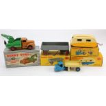 Dinky Toys. Four boxed Dinky models, comprising 'Breakdown Lorry' (no. 25x); 'Mechanical Horse and