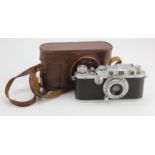 Leica DRP Ernst Leitz Wetzlar camera (no. 272919), with Leitz Elmar f=50cm 1:3.5 lens, contained