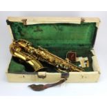 Martin Elkhart low pitch saxophone (no. 42681), with neck piece, contained in a case