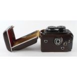 Yashica Mat camera (MT7050592), contained in original leather case, camera height 14cm approx.