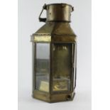 Railway interest. Large brass railway lamp with three panes of glass and wooden handle, height