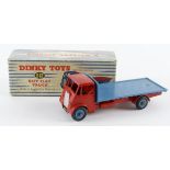 Dinky Toys, no. 512 'Guy Flat Truck' (red cab * chassis, blue back & hubcaps), contained in original