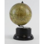 Philips Graphic Globe, circa early 20th Century, diameter 4 inches, on a turned wooden base, total