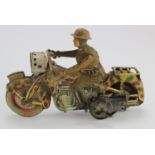 German Arnold 754 tinplate Military despatch rider, mechanism winds but doesn't run, length 19cm