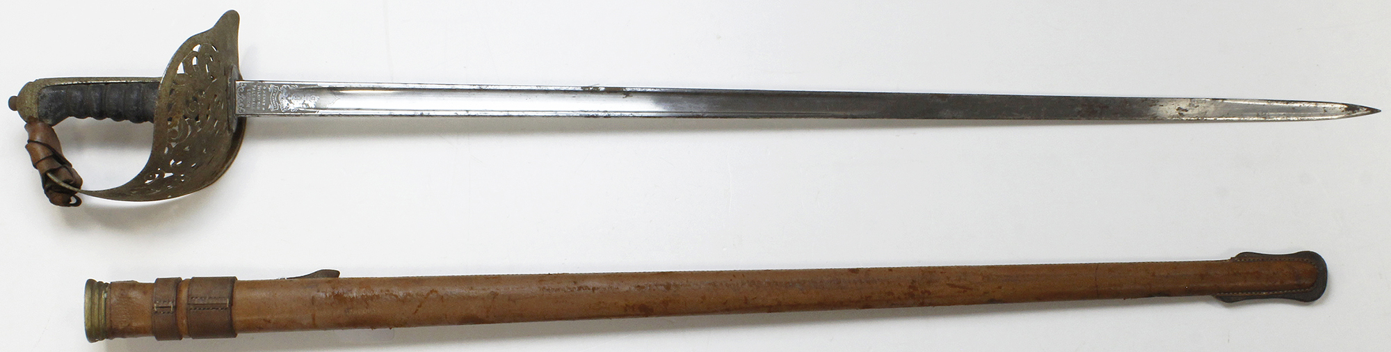 Sword Wilkinson made 1897 pattern NCO Infantry Officers pattern with plain blade in its leather