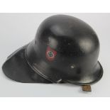 German Fire Police steel helmet with protective heat flap and chin strap, double decals.