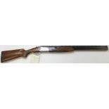 Shotgun, a good over and under 12 Bore trap gun, by Lamber (Spain). Barrells 27", engraved action.