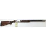 Shotgun, a good over and under 12 Bore trap gun, by "Classic Doubles", engraved side panels, barrels