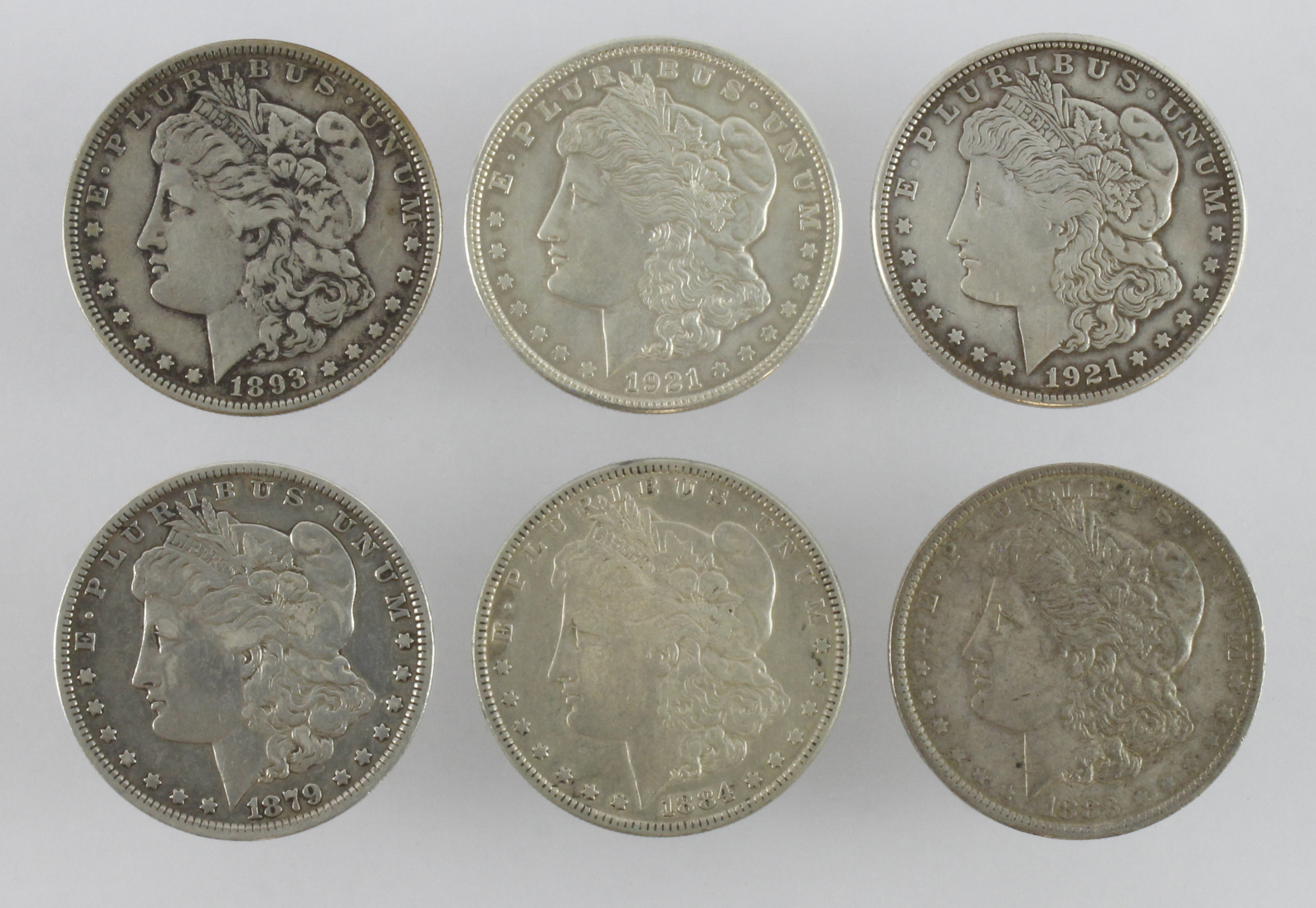 USA silver dollars (6) All Morgan type. 1879, 1883o, 1884, 1921 & 1921s. Average VF - GVF