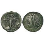 Celtic Gaul bronze unit of the Carnutes 1stC BC. Stylised hd. l. / Eagle facing, wheel above. 2.83g.