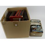 Large quantity of old mostly empty cigarette card albums / useful reference books and a quantity