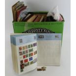 Merrydown box of World stamps housed in several albums, several of which are juvenile types. Two