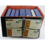 Large red box with 4 albums of GB FDC's to 1985 many better pmks (approx 650), 2 albums Scots