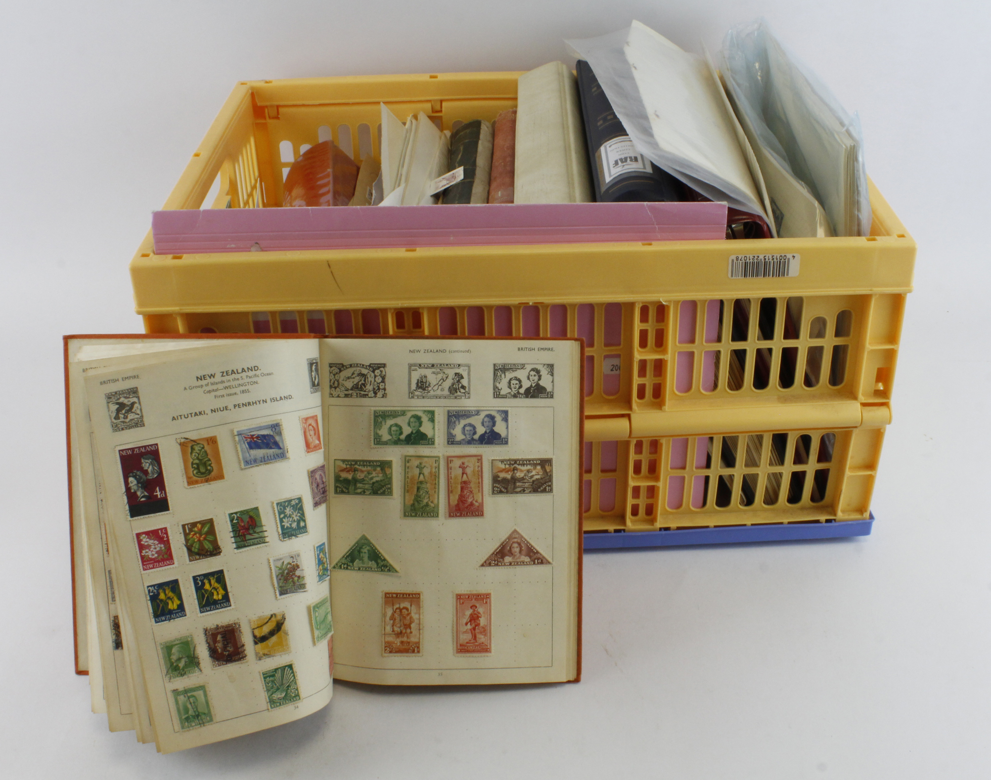 Large folding plastic crate with a varied mix of British Commonwealth. Ring Binders, stock books and