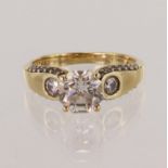 Yellow gold (tests 14ct) certificated diamond solitaire ring, GIA certificated octagonal modified