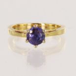 18ct yellow gold tanzanite solitaire ring, one round cut tanzanite measures 6mm, six claw setting,