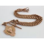 9ct "T" bar pocket watch chain with sporting medal attached. Length approx 38.5cm, weight 51.1g