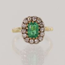 Yellow gold (tests 18ct) vintage diamond and synthetic emerald cluster ring, octagonal step cut syn.