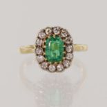 Yellow gold (tests 18ct) vintage diamond and synthetic emerald cluster ring, octagonal step cut syn.