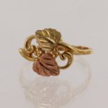 Tri-colour gold (tests 10k) Landstrom's vine ring, with yellow, rose and green gold, finger size Q/