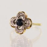Yellow gold (tests 18ct) diamond and sapphire floral cluster ring, round sapphire measures 4mm,