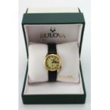 Gents 14ct cased Bulova Accutron wristwatch. The cream dial with gilt roman numerals, day/date