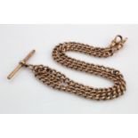 Rose gold (tests 9ct) double Albert chain with T-bar, length 18", weight 20.1g.
