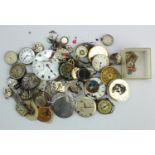 Small box of assorted mechanical, automatic and quartz watch movements and dials, approx. thirty