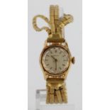 Ladies 18ct gold cased manual wind wristwatch by Zenith. The cream dial with gilt baton markers.