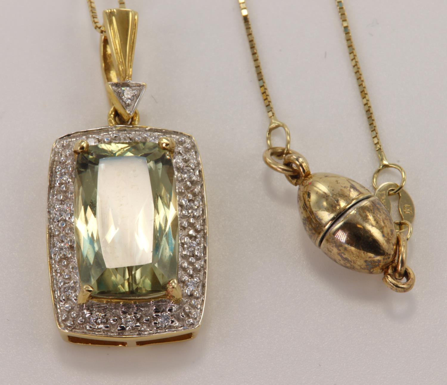 18ct yellow gold zultanite and diamond pendant, octagon step cut zultanite measures 13mm x 8mm,