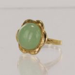 Yellow gold (tests 14ct) jade dress ring, round cabochon jadeite jade, diameter 11mm, bezel