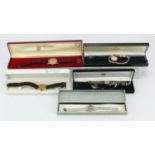 Assortment of ladies & gents wristwatches to include three 9ct cased examples