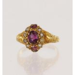 Yellow gold (tests 15ct) antique pink tourmaline and seed pearl ring, cluster measures 10mm x 8mm,