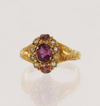 Yellow gold (tests 15ct) antique pink tourmaline and seed pearl ring, cluster measures 10mm x 8mm,