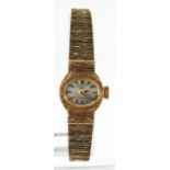 Ladies 9ct Gold cased Rotary wristwatch, on a 9ct Gold strap, chip to dial, total weight 15.2g