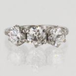 Platinum (tests 950 ) vintage diamond trilogy ring, three old European cut round diamonds, principle